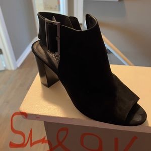 Black open toe and heel suede shoe